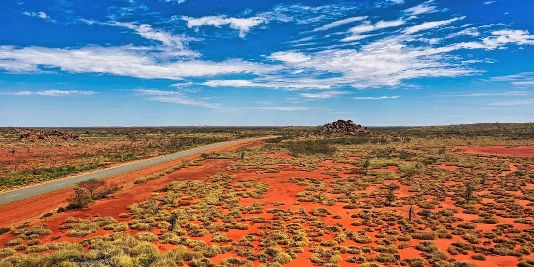 A road stretches across the vast Northern Territory landscape, representing TSA Riley’s support for Power and Water Corporation’s essential infrastructure program. thumbnail