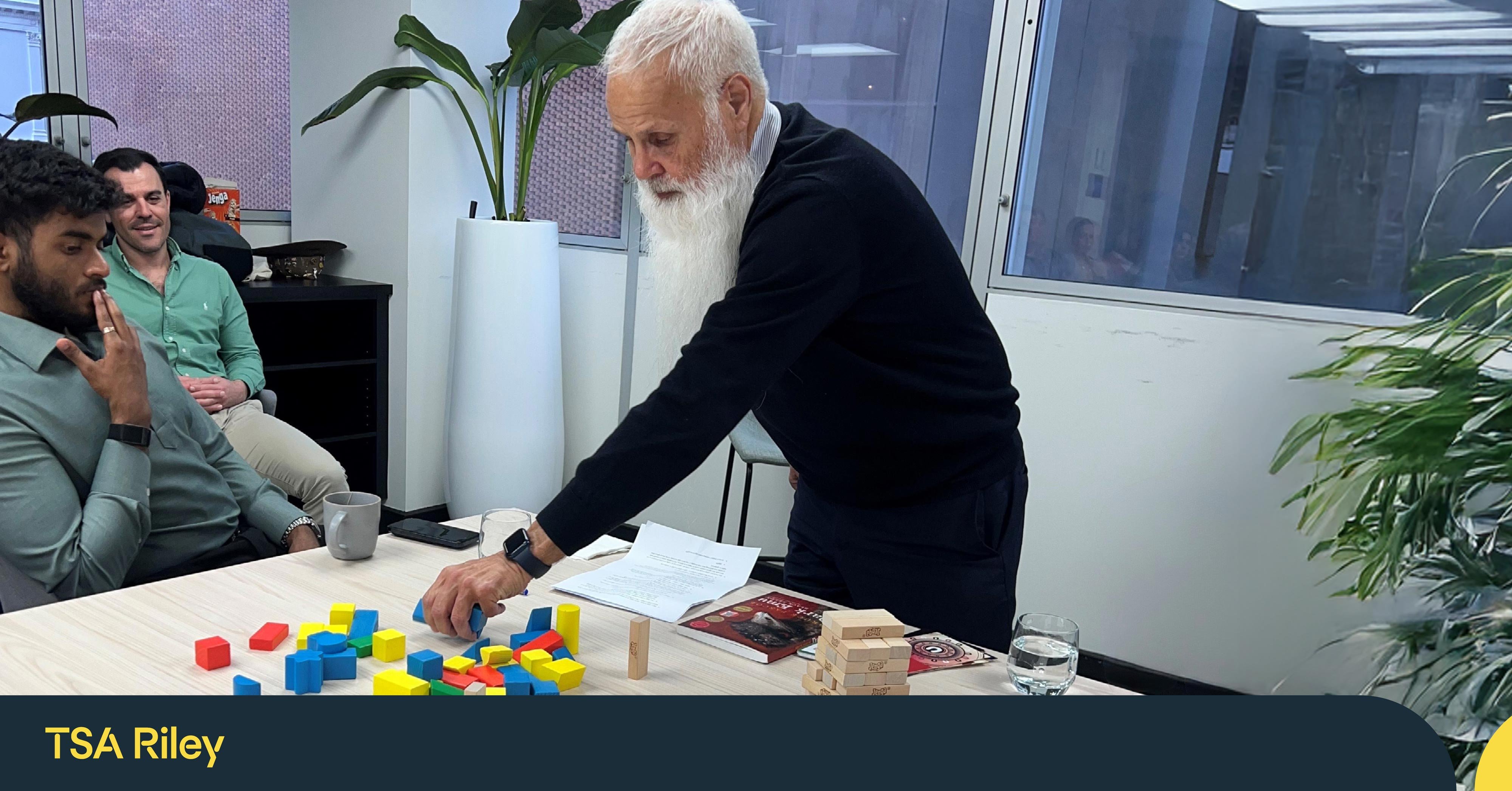 Uncle Parry Agius using building blocks to bring his message to life
